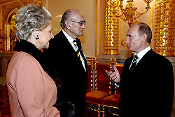 Vladimir Putin with Prince and Princess Dimitri of Russia.jpg